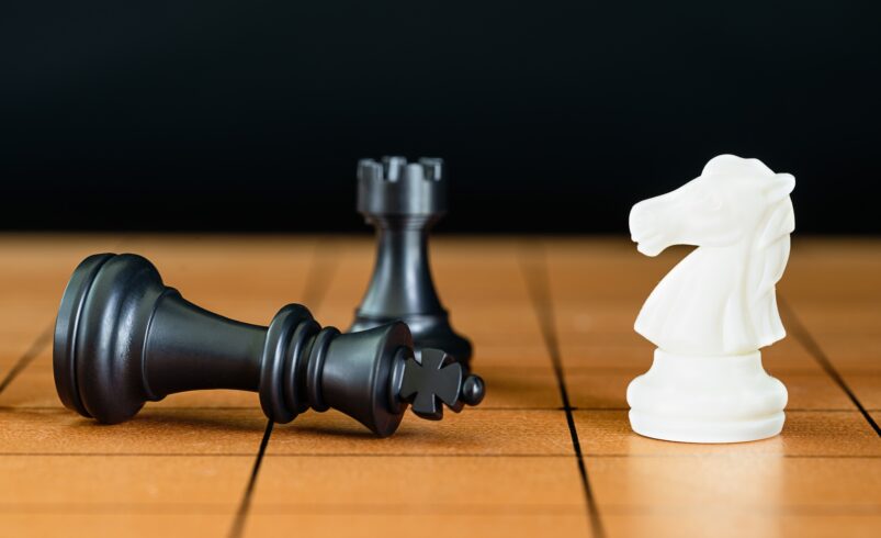 Chess pieces on a wood chessboard-5