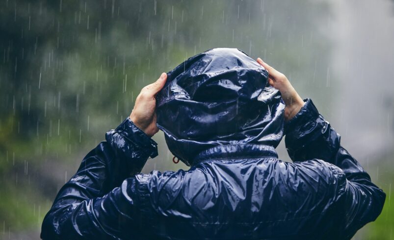Traveler in heavy rain