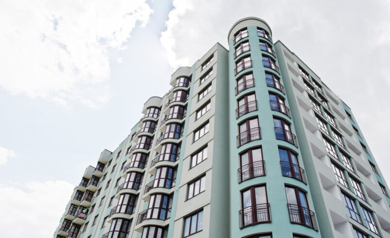 Balcony of new modern turquoise multi storey