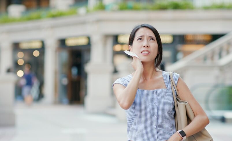 Woman feeling so hot in the city